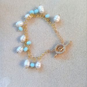 Pearl, crystal and gold plate bracelet with pave toggle